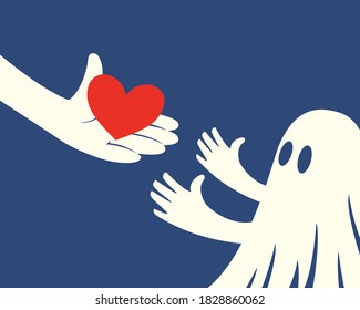 Close up of hand holding red Heart and a children with white ghost costume on blue background