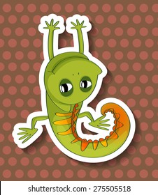 Close up lizard with brow polka dot background