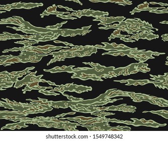 Close range Tigerstripe (French Lizard) camouflage seamless pattern. Green, brown, olive on black background.