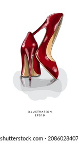 close up of red high heels on white background