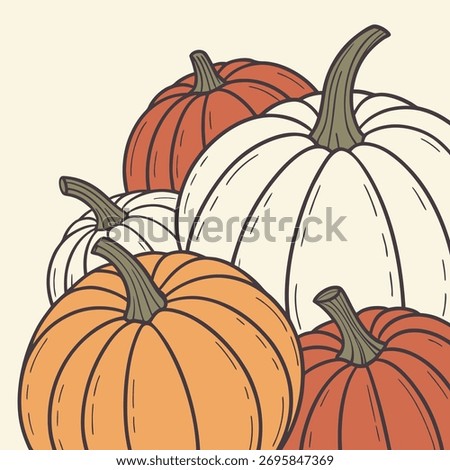 A close up shot of a group of pumpkins clustered tightly together filling the entire frame