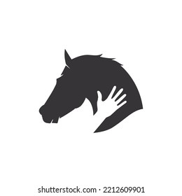 close up silhouette horse with hand. People and animals friendship concept.