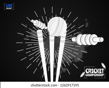 Close view of cricket ball hitting on the stumps, b&w concept based template design for Cricket Championship.