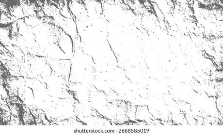 Vista de cerca de una superficie de piedra gris áspera con detalles texturizados y grietas.
