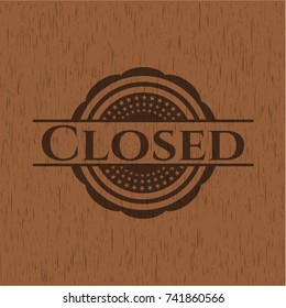 Closed badge with wood background