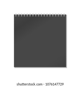 Closed black realistic notepad notebook with spiral is isolated on white background.