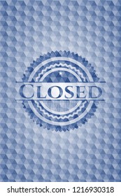 Closed blue hexagon emblem.