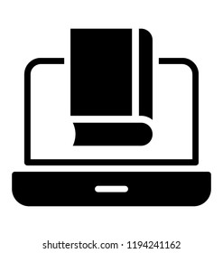 Closed book over laptop screen indicating ebook icon 