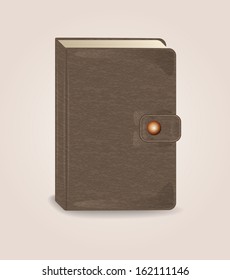 closed brown book with clip and  shadow