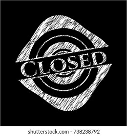 Closed chalk emblem written on a blackboard