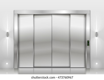 Closed door of the freight elevator hospital or office building. Metal armored sliding door.