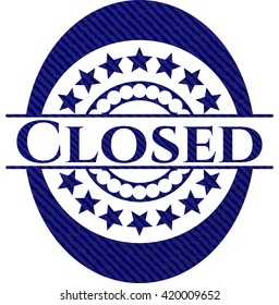 Closed emblem with jean background