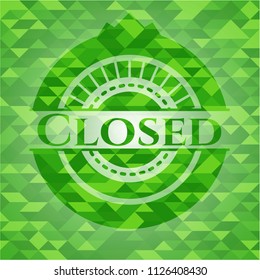 Closed green emblem with triangle mosaic background