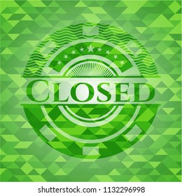 Closed green emblem with triangle mosaic background