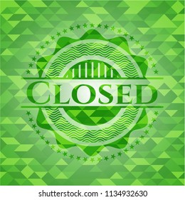 Closed green emblem with triangle mosaic background