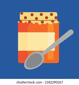 Closed jar with jam and spoon