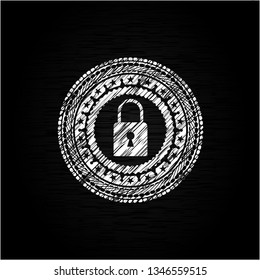 closed lock icon inside chalk emblem written on a blackboard