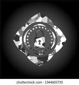 closed lock icon inside grey camouflage texture