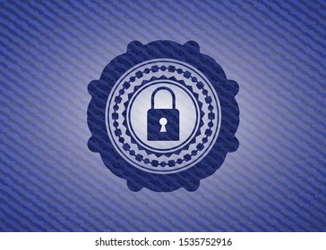closed lock icon inside jean or denim emblem or badge background