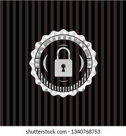 closed lock icon inside silver emblem