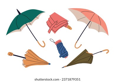 Closed, open, folded umbrellas in different colors