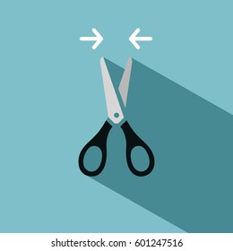 Closed scissors icon with shadow on blue background