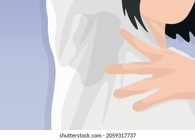 Close-up asian woman with hyperhidrosis sweating. Young asian woman with sweat stain on her clothes against grey background