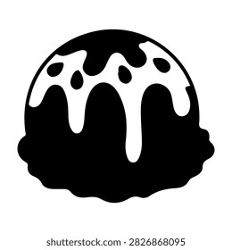 Close-up of a black and white cookie featuring melting icing pattern on a plain background.