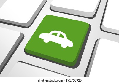 Close-up of green car computer icon on a keyboard button.