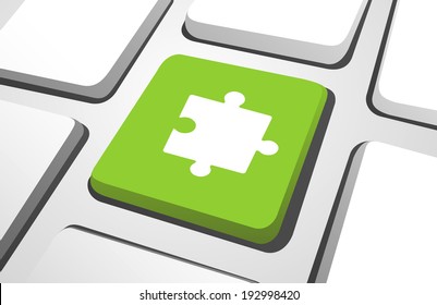 Close-up of green jigsaw puzzle computer icon on a keyboard button.