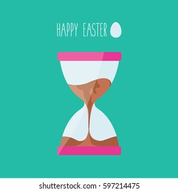 closeup & macro on a elegance classic clean Hourglass with a liquid chocolate flowing in it and happy easter text for holiday. hour or sand glass with sweet food & one single egg