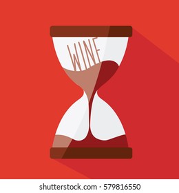 closeup on a elegance classic clean Hourglass with a wine flowing in it and red text