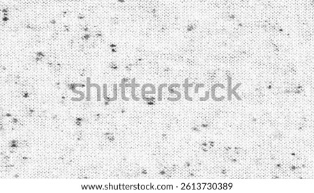 Close-up shot of a white fabric texture. Soft, smooth, and subtly textured.