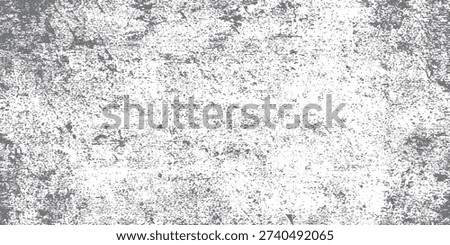 A close-up view of an abstract textured surface with a grunge effect, featuring a distressed pattern and monochromatic tones.