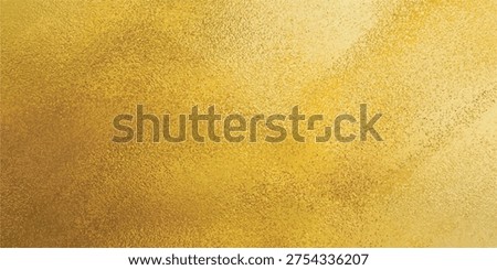 A close-up view of a golden textured surface, featuring subtle diagonal lines and a shimmering, metallic appearance.