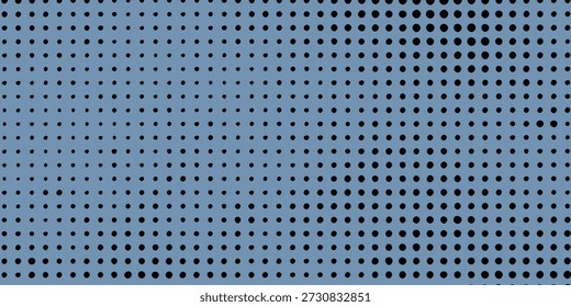A close-up view of a light blue perforated metal sheet, showcasing a regular pattern of small, dark circular holes.