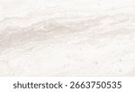 A close-up view of a light-colored travertine stone surface with distinct wavy veining and scattered speckles.