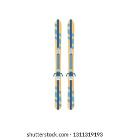 Close-up view of a pair of yellow and blue comfortable skis for skier with any level of training on a white background
