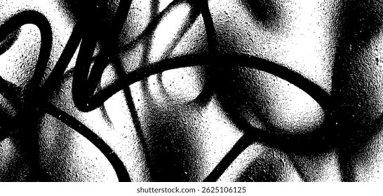 A close-up view showcases dynamic spray patterns from graffiti on a textured surface, emphasizing the beauty of urban art in a gritty setting. The interplay of monochrome tones adds depth.