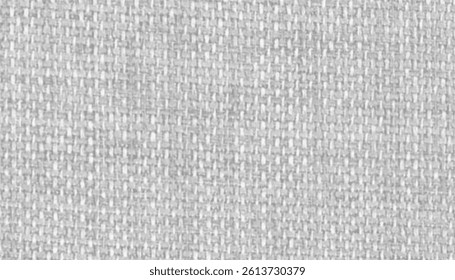 Close-up view of a textured grey fabric. The image highlights the detailed surface pattern.
