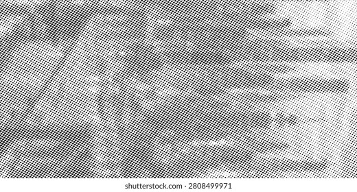 Close-up vintage halftone paper texture showing distressed ink dots and grainy newspaper print. Monochrome grunge background ideal for retro design, overlays, posters, and textured artistic compositions.

