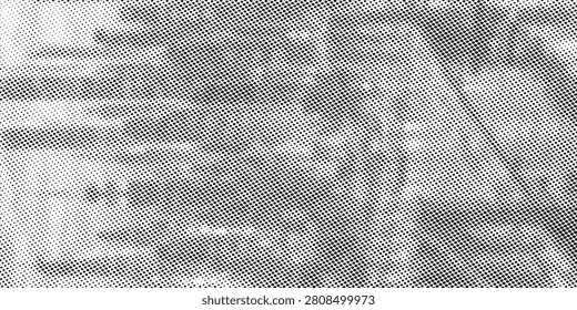 Close-up vintage halftone paper texture showing distressed ink dots and grainy newspaper print. Monochrome grunge background ideal for retro design, overlays, posters, and textured artistic compositions.

