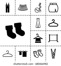 Cloth icon. set of 13 filled and outline cloth icons such as baby socks, hanger, jumpsuit, needle button