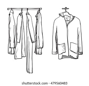 Clothes for autumn. Coat and jacket on the hangers