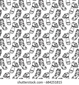 Clothes background. Socks Vector Seamless pattern. Hand drawn doodle socks. Black and white illustration