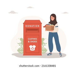 Clothes Donation. Islamic Woman With Cardboard Box Gives Things For Recycling Or Donated. Clothing Bin Or Recycle Container. Volunteering And Social Care. Vector Illustration In Flat Cartoon Style.