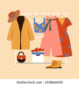 Clothes Hanger, Garment Rack, Showroom And Clothing Organization Concept. Clothes, Hangers, Shoes, Bags.