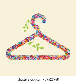 Clothes hanger made of flowers and branches. You could use this for: environmentally-friendly clothing, eco-friendly fashion and textiles, fair-trade products