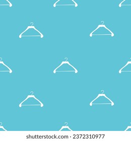 Clothes hangers seamless pattern. Diagonal minimalist pattern of empty hangers turned in opposite directions. Vector illustration