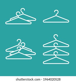 La ropa colga un conjunto de iconos simple. Logotipos minimalistas. Aislado. Ilustración del vector